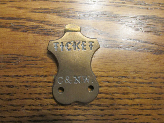 C&NW ( Ticket Clip ) Brass